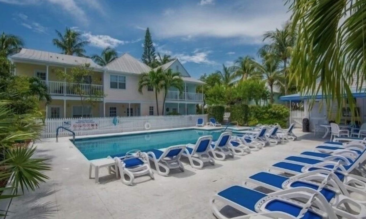 Truman Annex Condo | Bright & Modern Condo—7 MinWalk to the Beach! Pool, Bikes & 2 Furnished Porches!