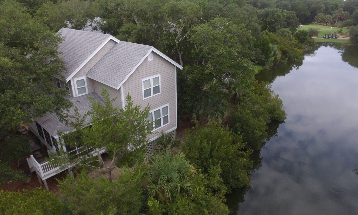 Sabal Palm Cottages House | Bright Pristine Cottage Sleeps 8 Shoals and Bhi Club New Bintelli Carts