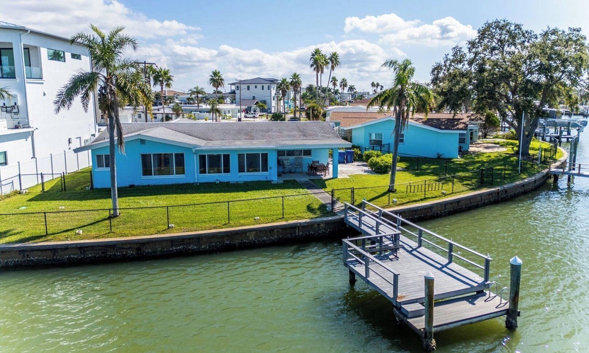 Redington Beach House | Bright Waterfront Home with Dock + Beach Close By