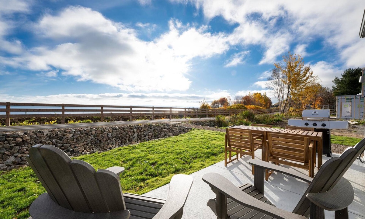 Petite-Riviere-Saint-Francois Condo | Panorama 1249: Majestic River View, Spacious Patio