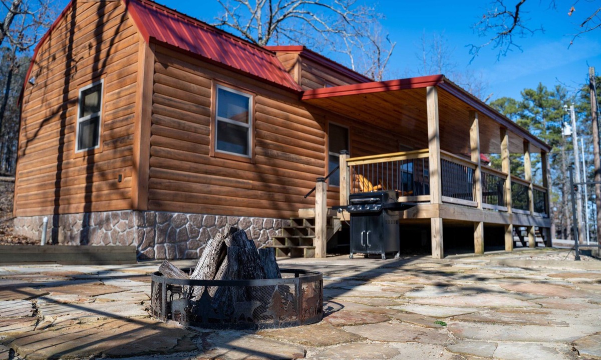 Gepp Cabin | Cabin featuring a vaulted ceiling, a large porch, and huge patio with fire pit.