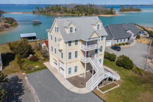 Topping House | Captivating Waterfront House with Pool, Private Dock, Elevator and Game room, Kayaks & Stunning Ocean Views