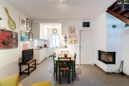 Bissone Apartment | Casa In Contrada by Quokka 360 - Colorful Village House on Lake Lugano