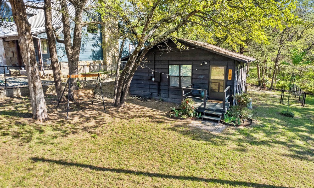 Gordonville Cabin | Cedar Bayou Hideaway with Hot Tub near Lake, Trails, & Casino! Sleeps 4.