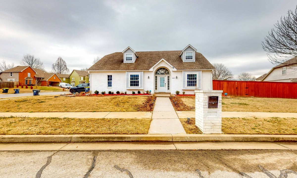 Jenks House | Centrally located home w/ a wood-burning fireplace