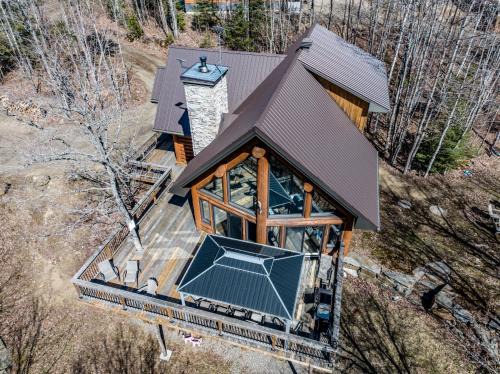 Mandeville Ski Chalet | Chalet bois rond avec spa, foyer et nature privée