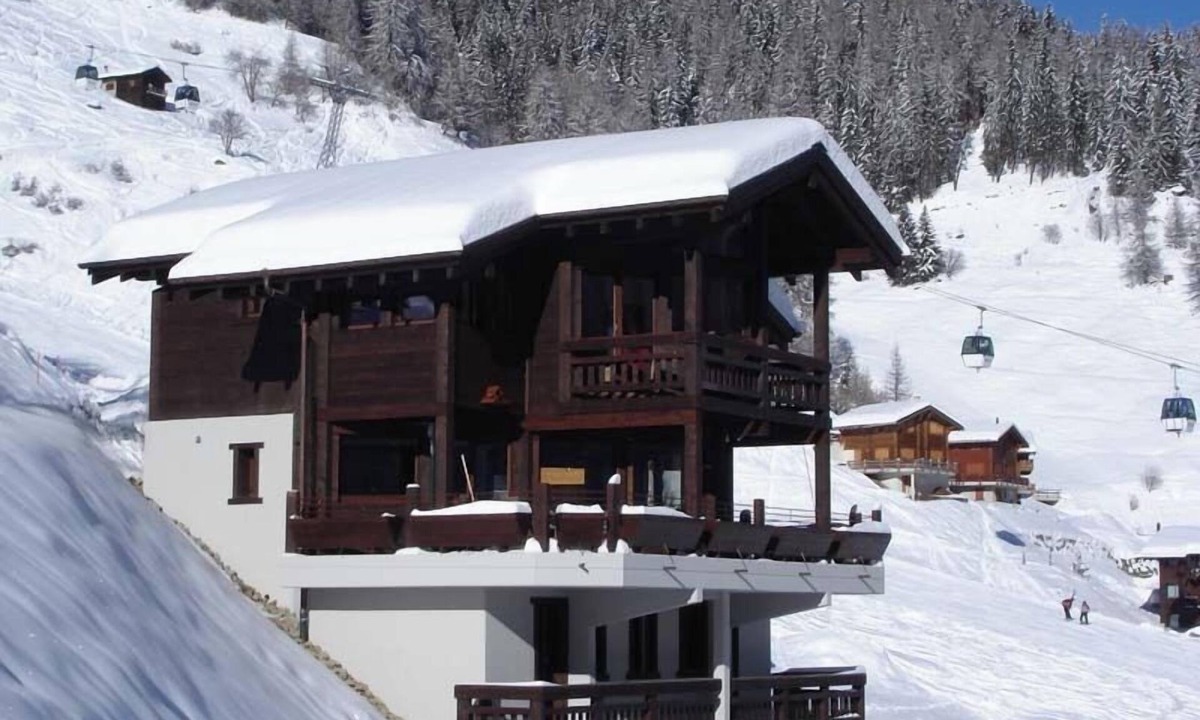 Grimentz Ski Chalet | Chalet high standing close to the slopes for 12 persons : 1. floor : living-room with wood stove - k