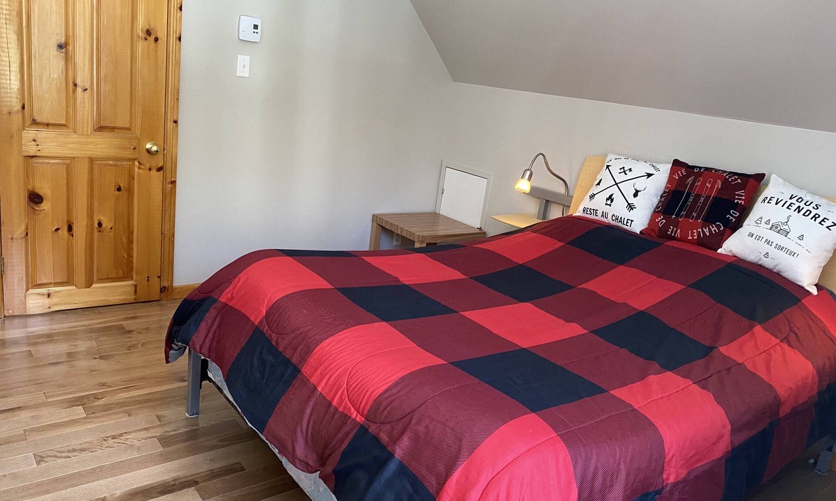 Mandeville Ski Chalet | Chalet l'Oasis with private lakeside beach and in-ground spa