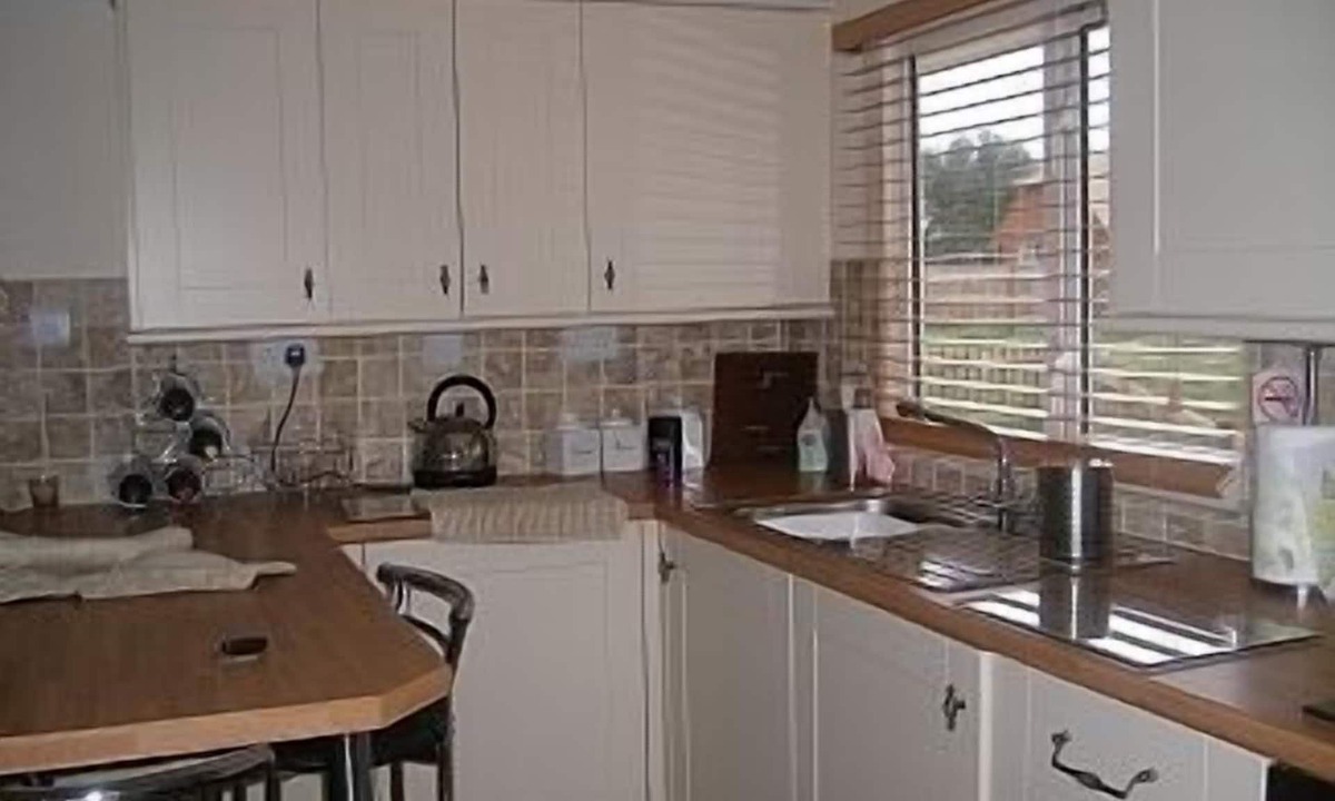 Matchams Ski Chalet | Chalet on small peaceful site with shared heated outdoor pool.