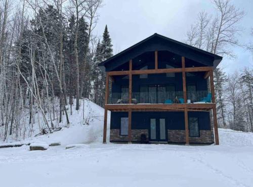 Mont Ste. Marie Ski Chalet | Chalet Relax with sauna steps from MSM lodge