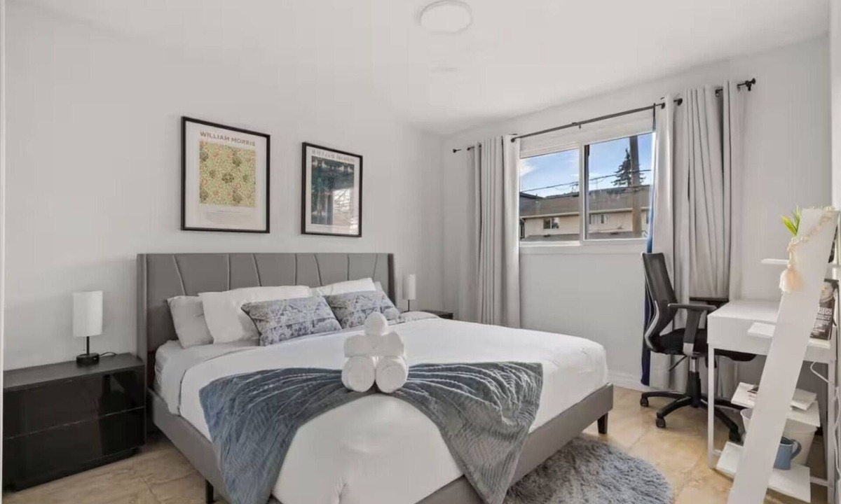 Montgomery House | Charming 4-bedroom house with AC in vibrant Calgary