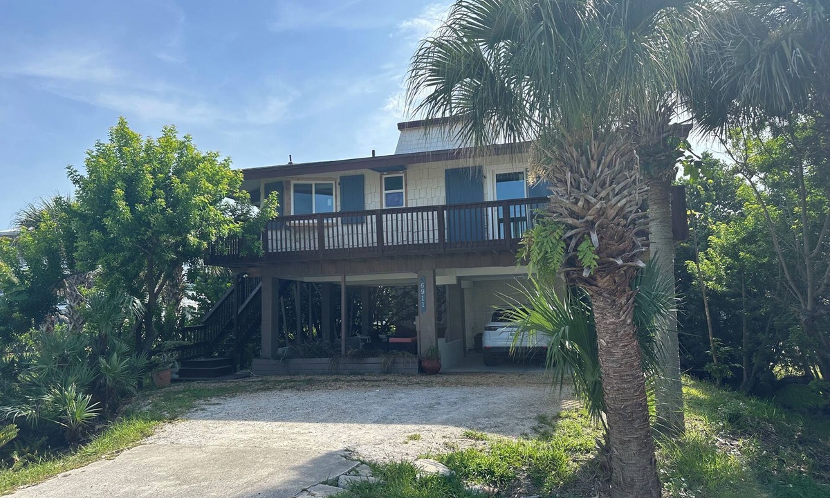 Bethune Beach House | Charming beachside bungalow steps from the beach.