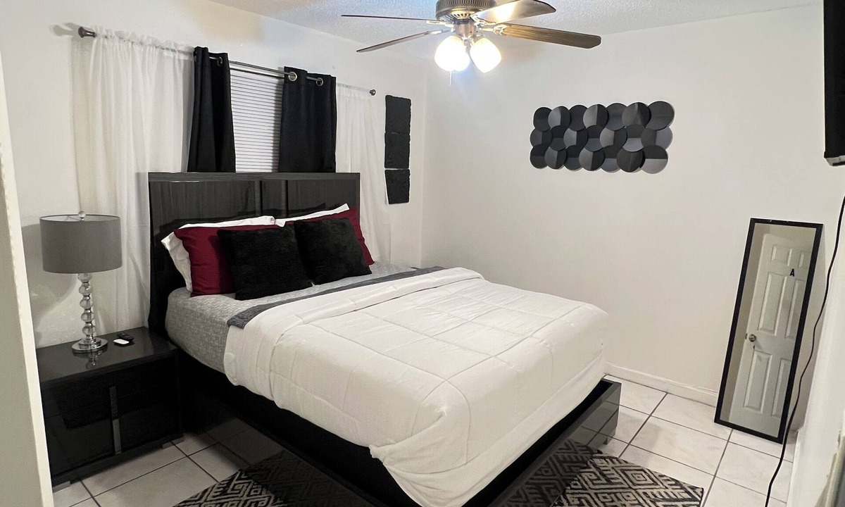 Margate House | Charming bedroom in a shared home.