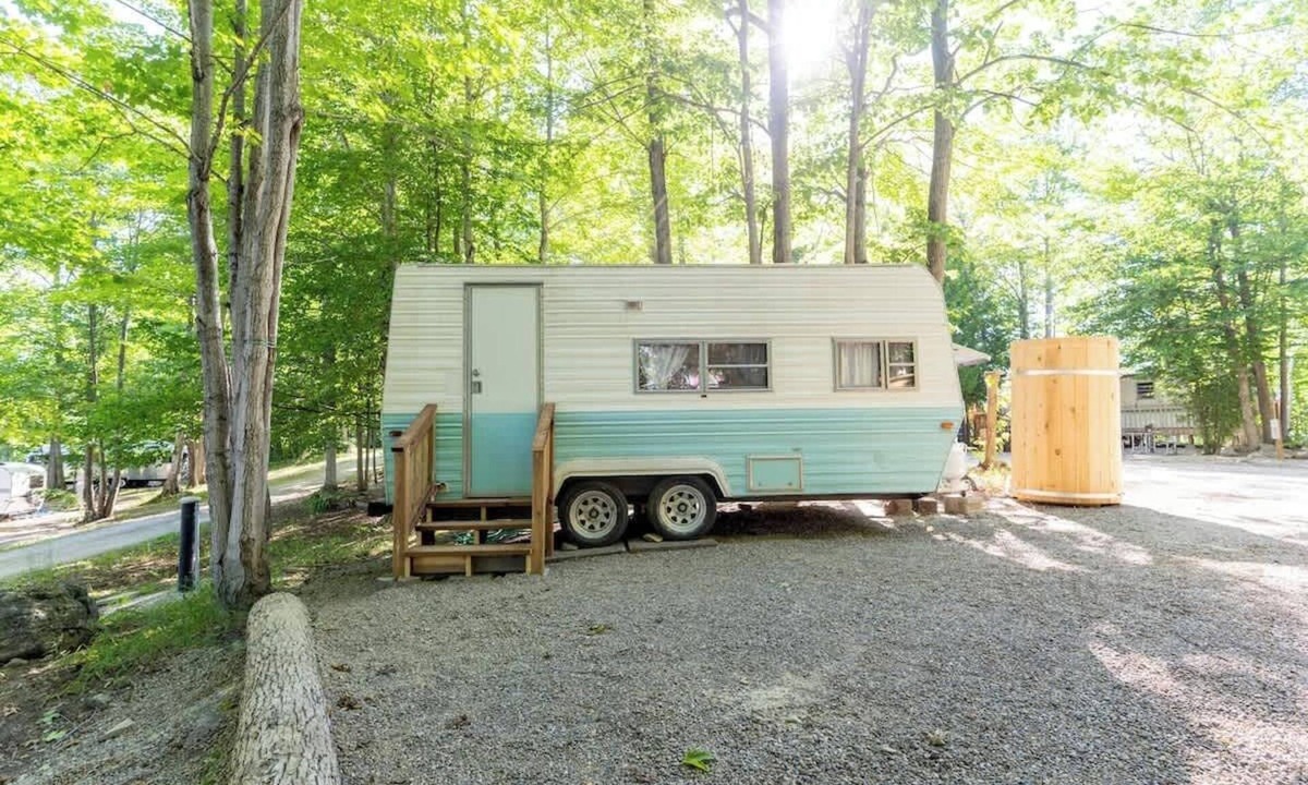Miller Lake House | Charming Blue Glamping RV Close to Grotto