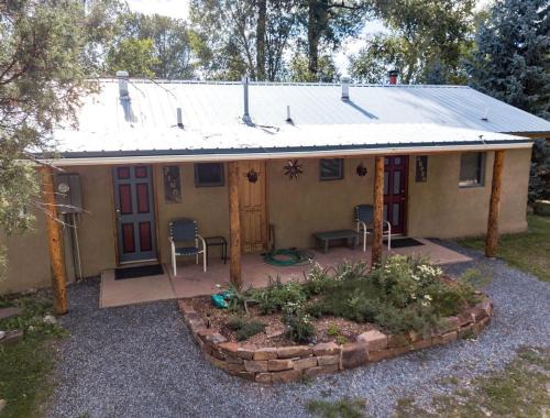 Pecos House | Charming Cabin Retreat: Fireplace and River Views in San Miguel County, NM