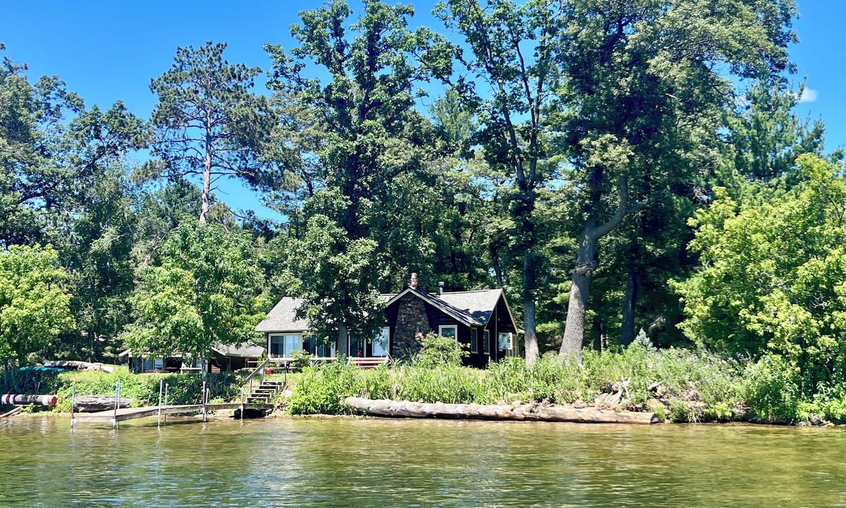Spooner House | Charming Cabin with Beautiful Spooner Lake Front