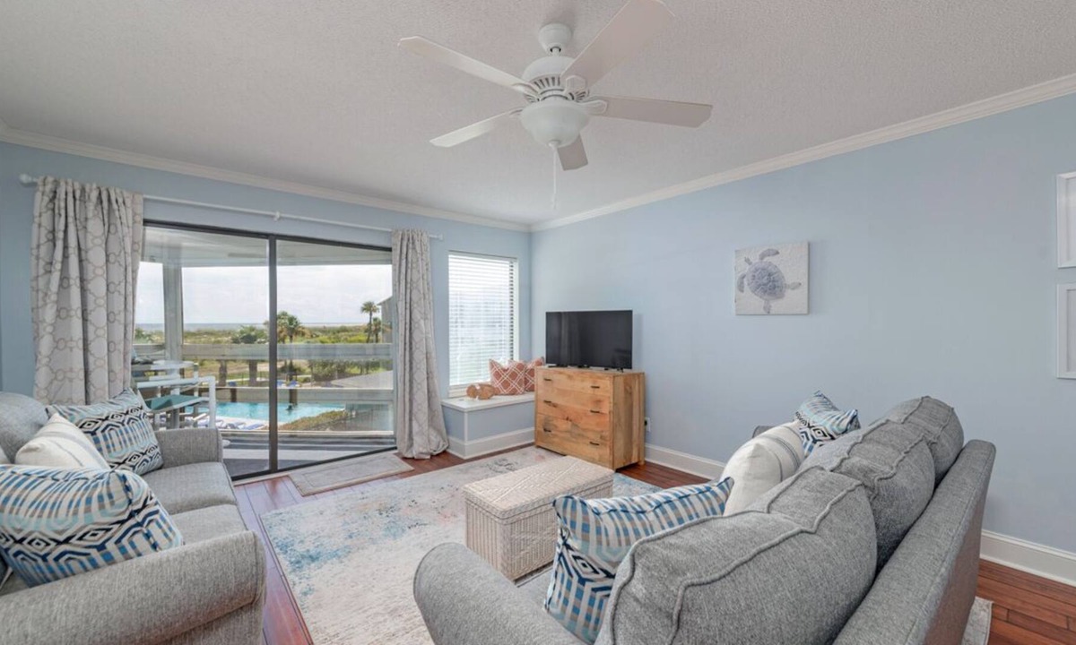 Oceanmarsh Subdivision Condo | Charming condo with a screened-in porch, water views, and access to complex pool
