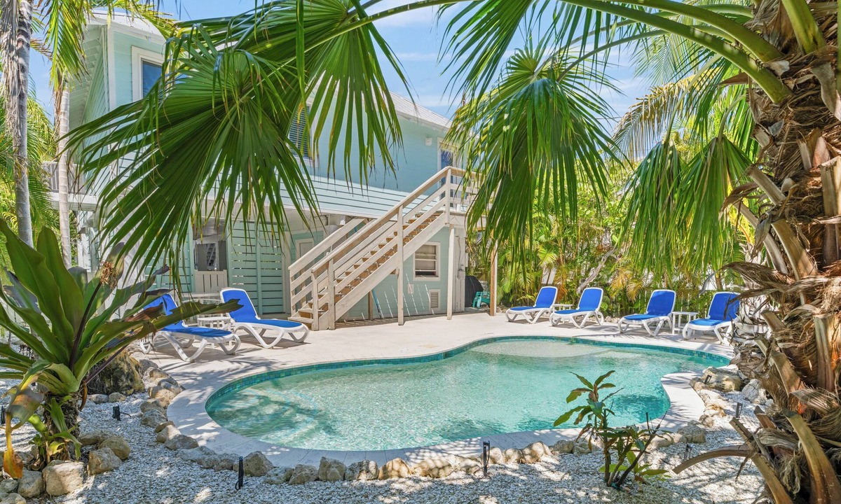 Anna Maria House | Charming cottage with heated pool, tropical landscaping in prime location.