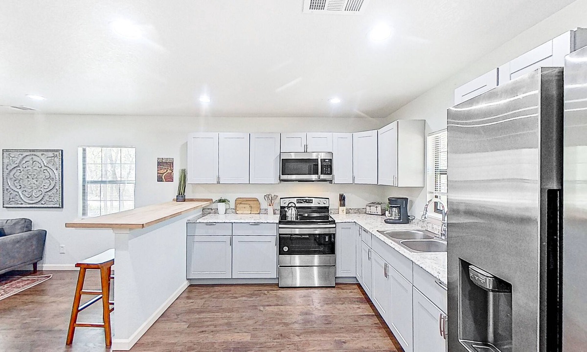Blanco Cabin | Charming home with grill, full kitchen, central AC, & W/D