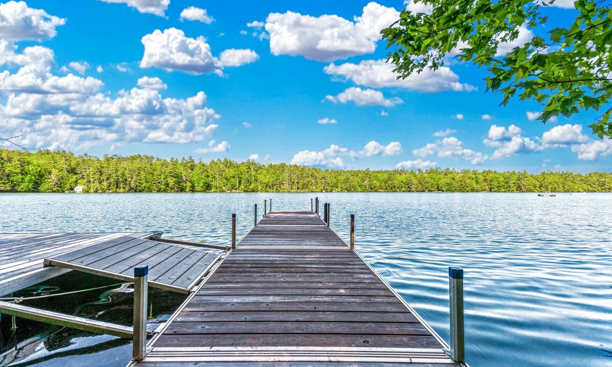 Center Harbor House | Charming lakefront cabin with private dock, deck & screened porch