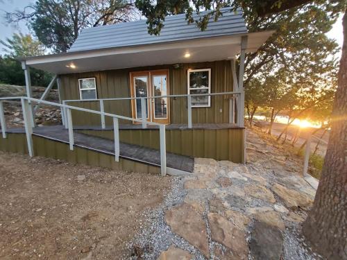 Cisco House | Charming Lakefront Cabin with Sandy Beach Access & Fire Pit Near Lake Cisco, TX