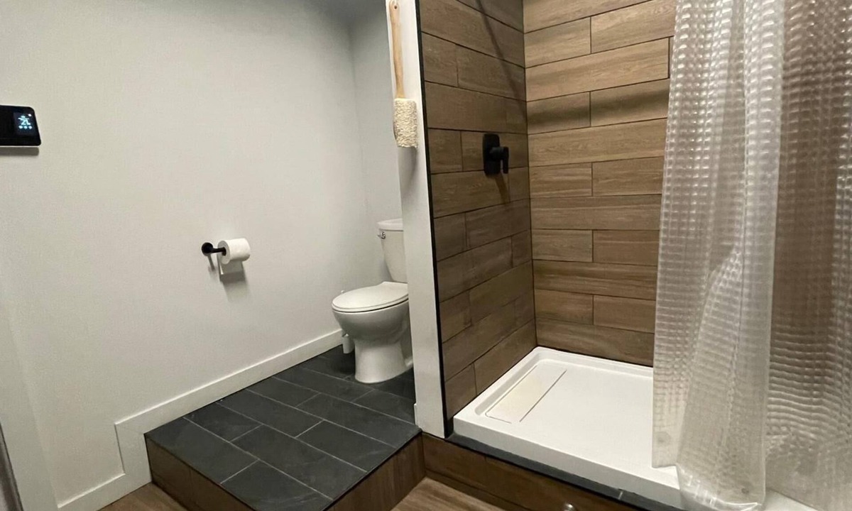 Sault Ste. Marie Apartment | Charming Prohibition-Era Speakeasy Lounge with Bedroom and Commercial Kitchen