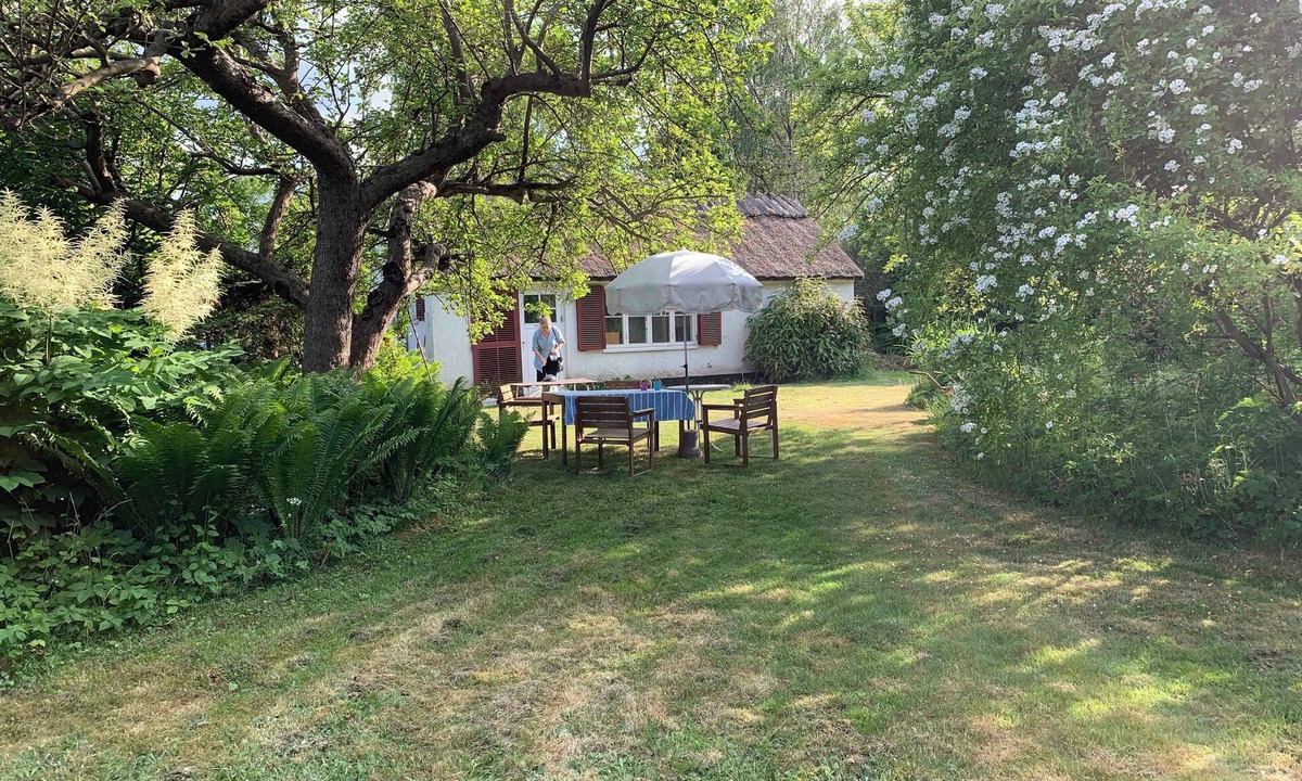 Dronningmolle House | Charming thatched-roof cottage from 1947