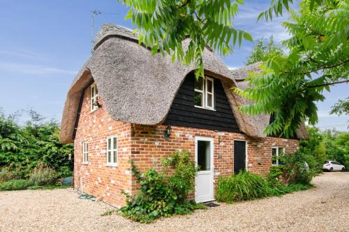 Martin House | Charming thatched cottage near New Forest