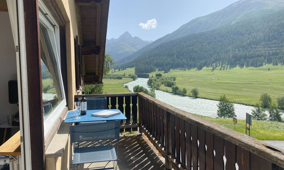 Zuoz Apartment | Chesa Sur En with a view of Piz Mezzaun and Uter