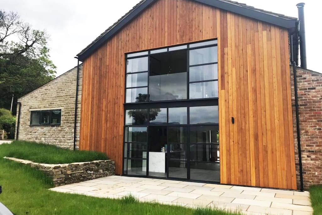 Sutton House | Cheshire Barn. views, bbq, fire pit, TV, Wifi