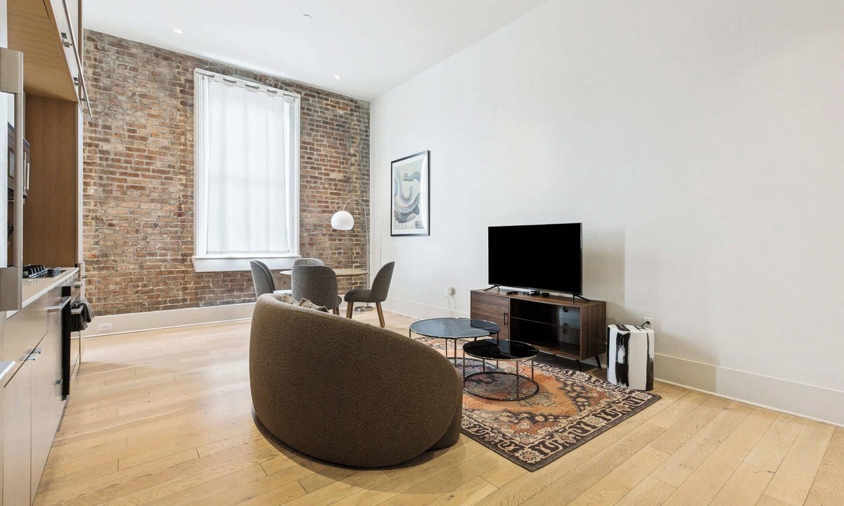 Tulane - Gravier Apartment | Chic 1BR in Historic School House | Gated Parking Included