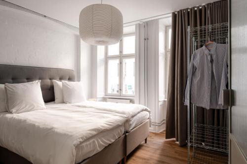 Indre By Apartment | Chic city pad with handpainted art in great location by Daniel&Jacob's