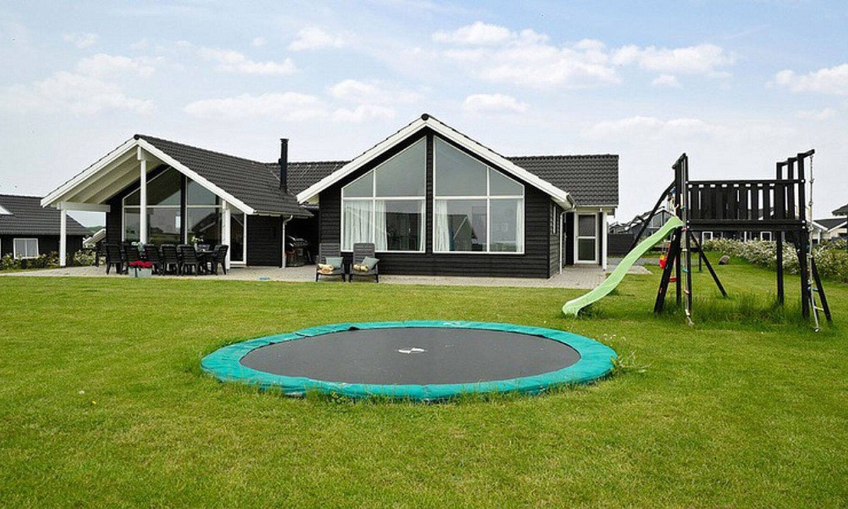 Skastrup Strand House | Chic pool and activity house with 5 bedrooms, 2 bathrooms, fireplace and WiFi