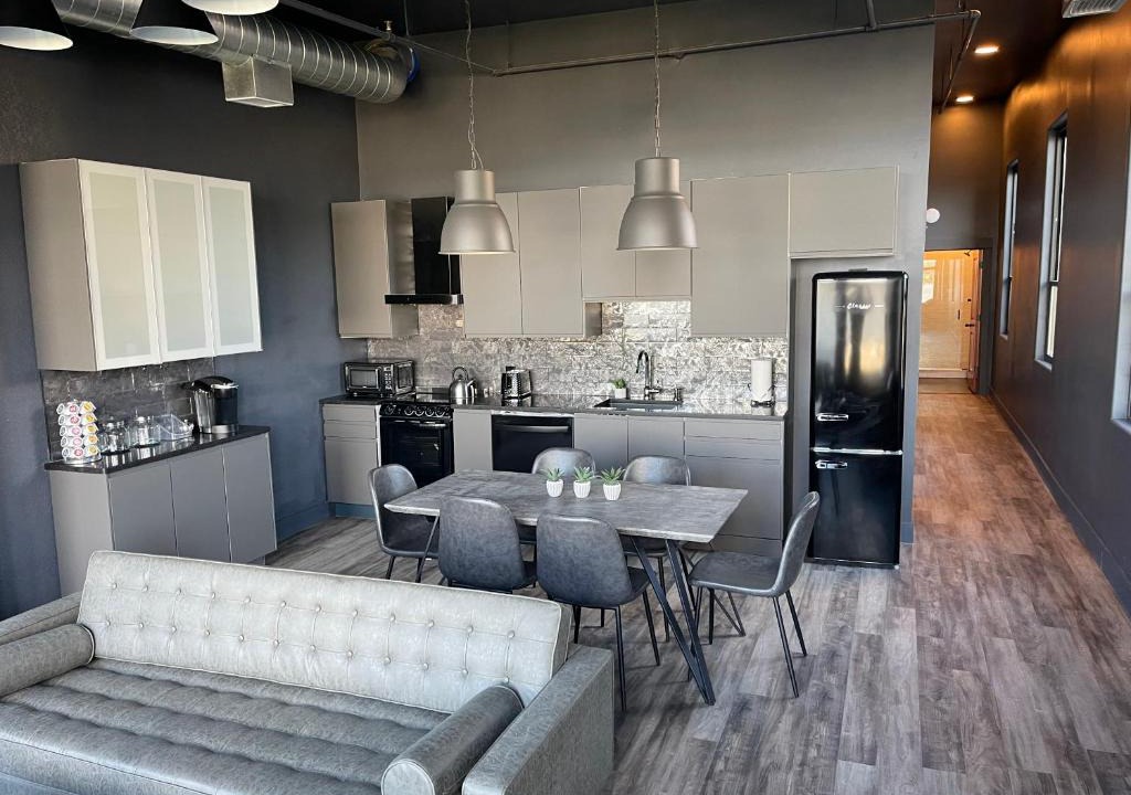 West Main Historic District Apartment | City Loft Escape with River Views! By Hollyhock