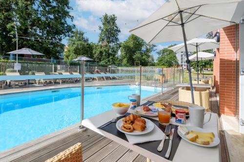 Saint - Martin - du - Touch Hotel | Clarion Aparthotel Toulouse Le Parc de l'Escale