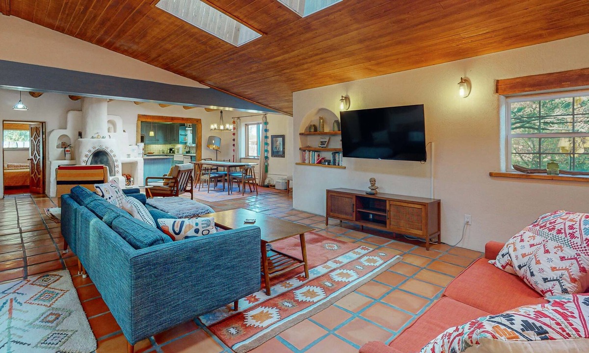 Taos House | Classic Adobe with hot tub, covered patio & pond near town