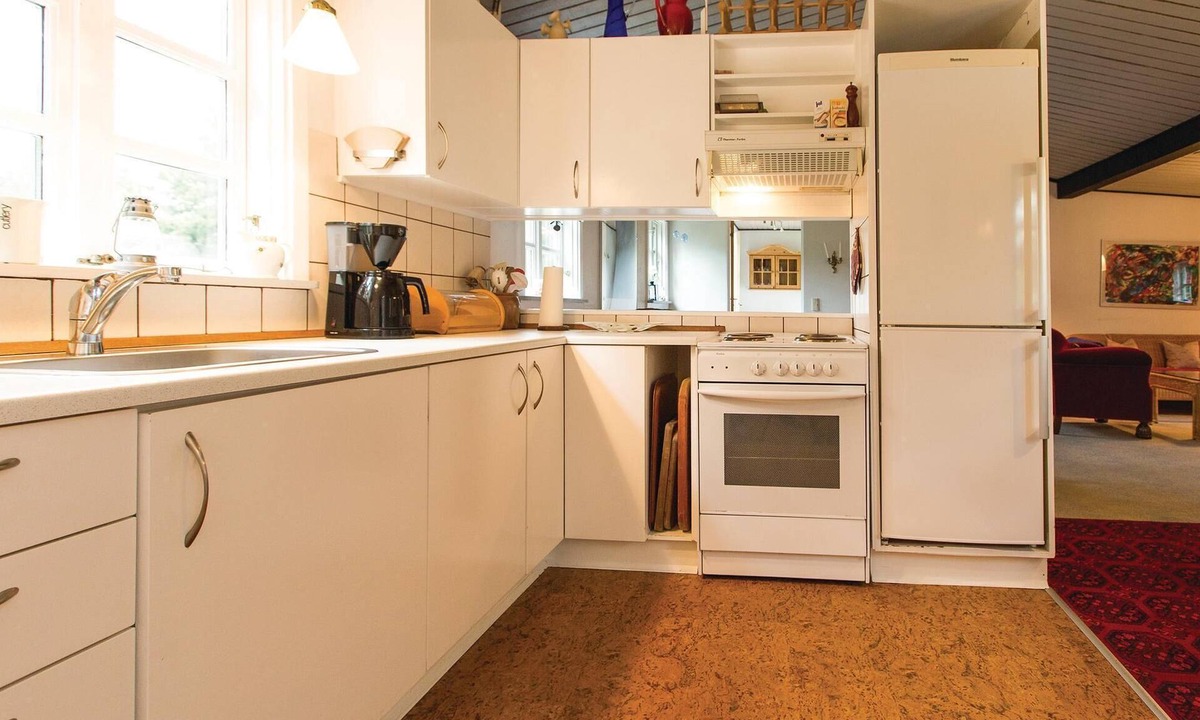 Hojby House | Classic vacation home with plenty of space in the garden to play.