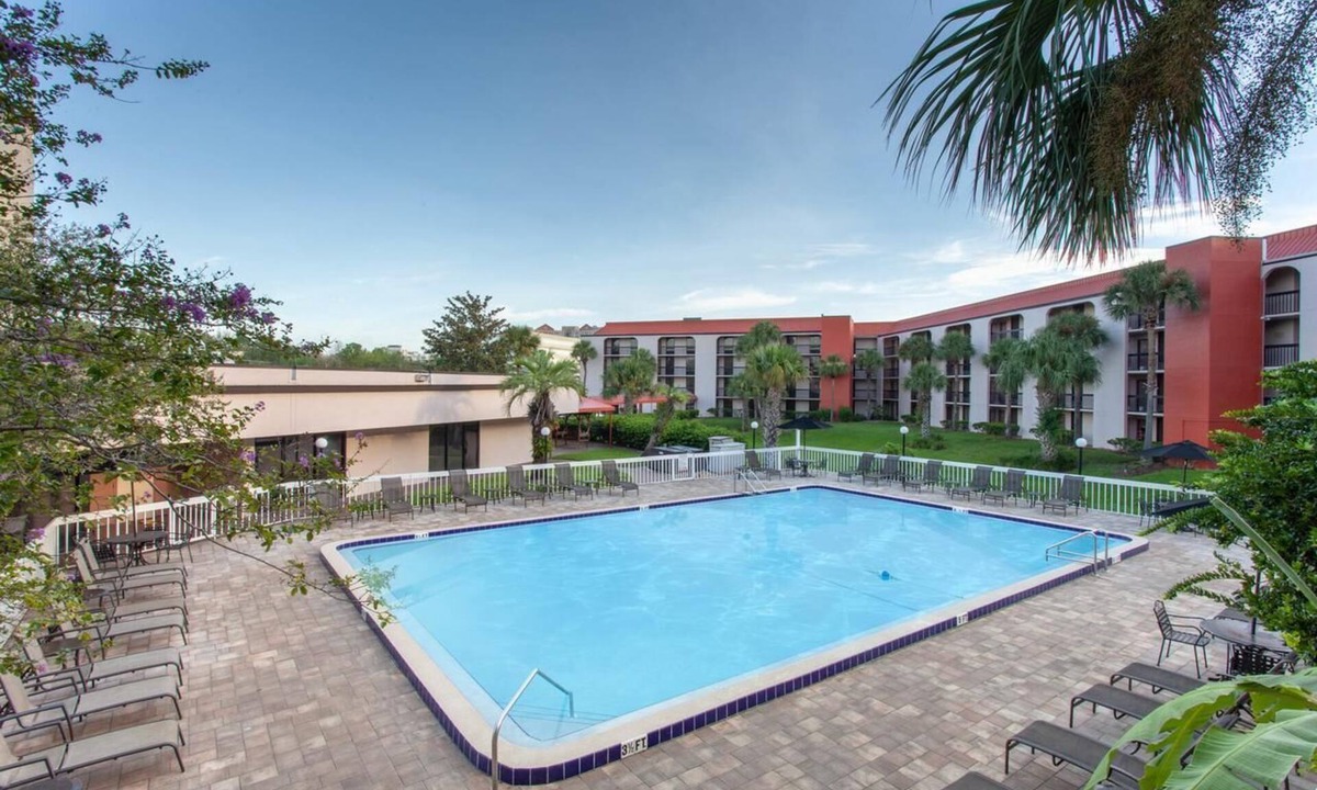 Florida Center Hotel | Close to Attractions! Comfy Unit, Pool, Shuttle to Parks, Parking, Breakfast