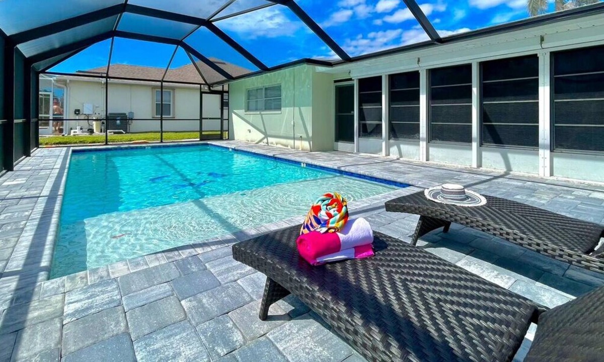 Eight Lakes House | Coastal Charm with Heated Pool