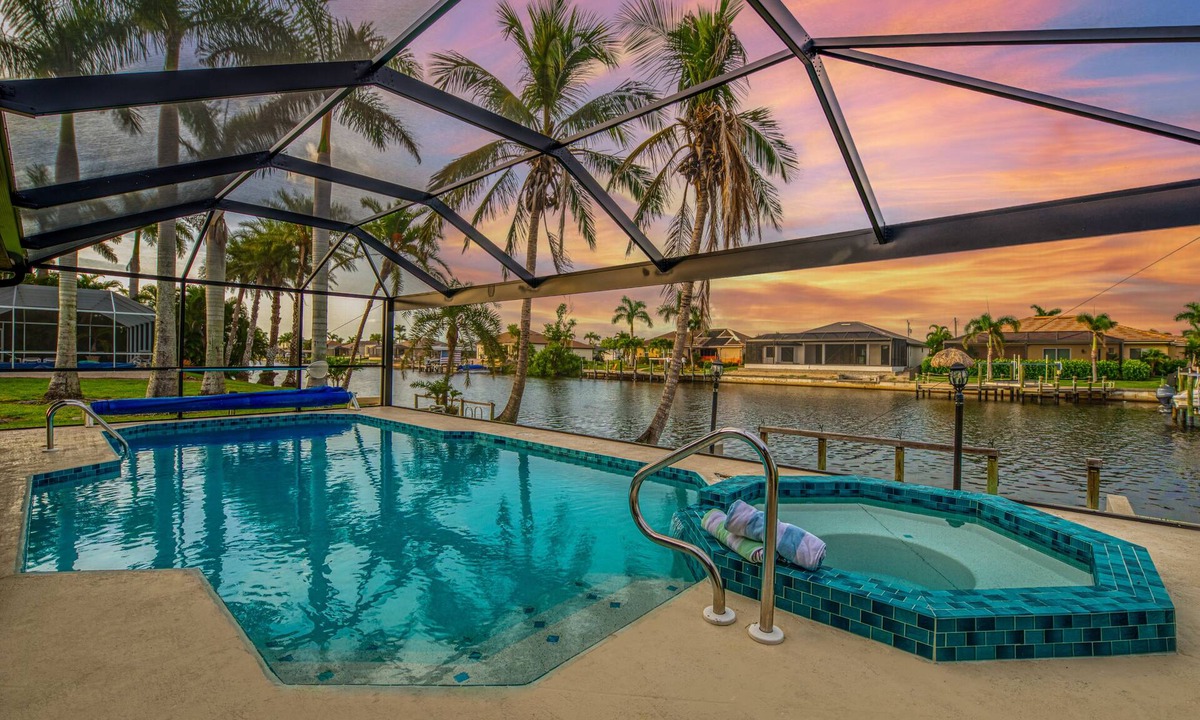 Pelican House | Coconut Cove/Scenic Waterfront Escape with Private Heated Pool & Spa