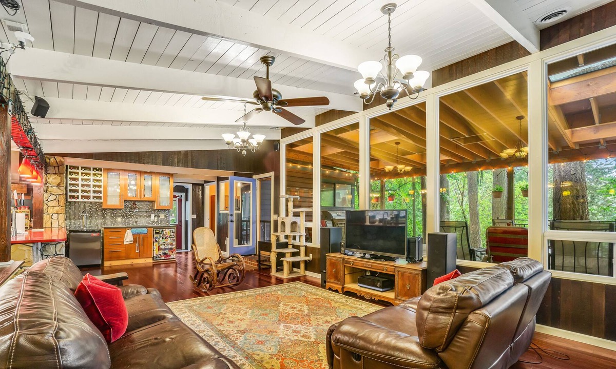 Shoreline House | Colorful dog-friendly getaway with covered deck, firepit, fast WiFi, & grill