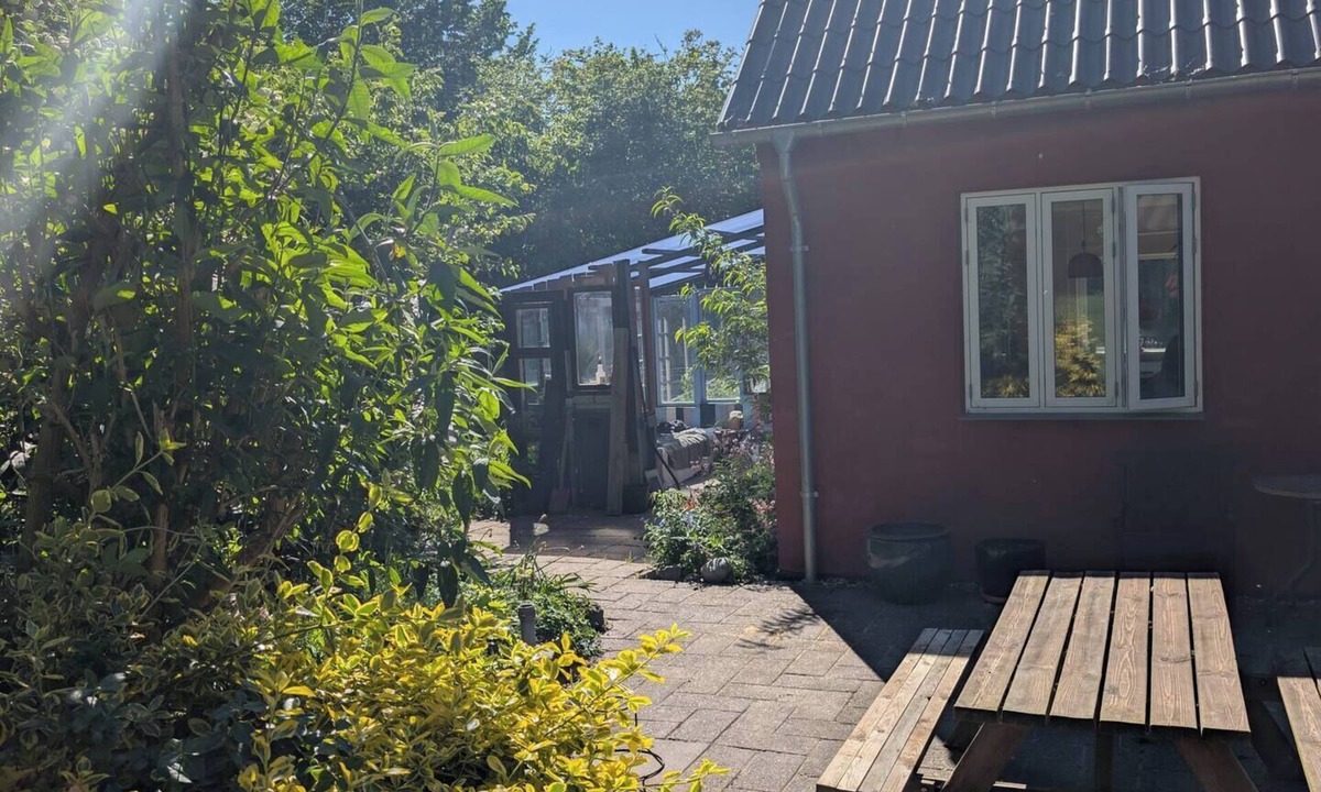Hesselager House | Colorful home on a natural plot with its own small forest