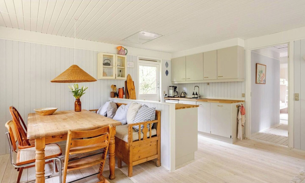 Hoeve Strand House | Colourful details in wooden house on nature plot