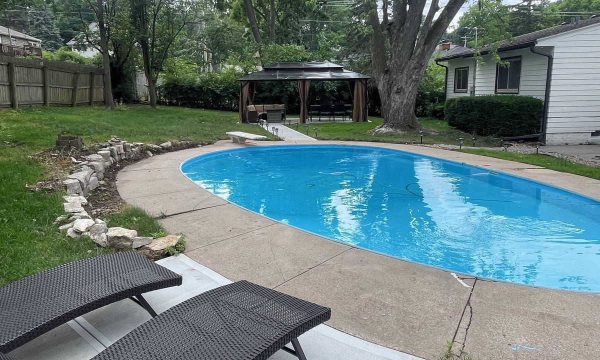 South Central Omaha House | Comfort & Space: 5BR Family Getaway w/Pool, Fire Table, and game room!