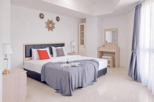 Pondok Aren Apartment | Comfortable and Homey 1BR Tamansari Bintaro Mansion Apartment By Travelio