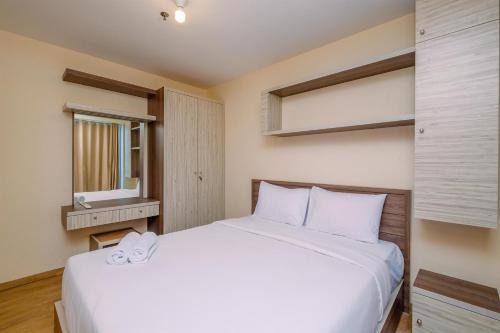 Kayu Putih Apartment | Comfortable and Warm 2BR at Tifolia Apartment By Travelio