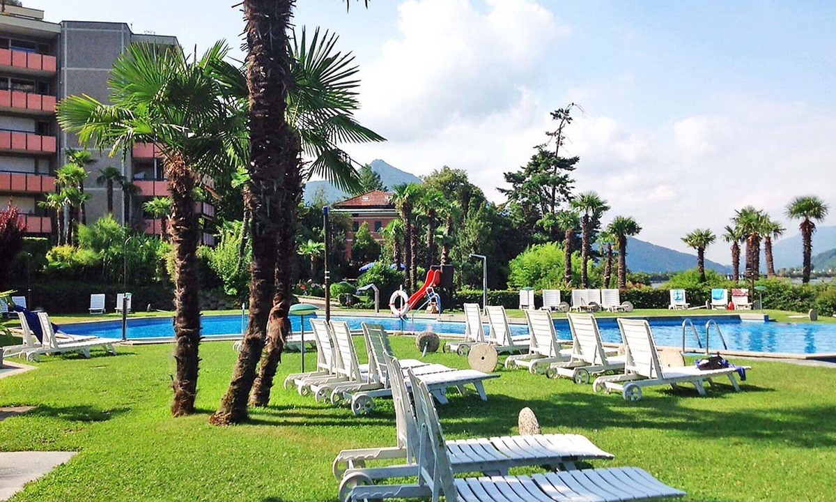 Bissone Apartment | Cosy apartment for 4 guests with A/C, WIFI, pool, TV, balcony and panoramic view