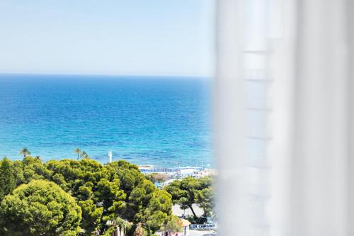 Dehesa de Campoamor Apartment | Cosy, seaview apartment, close to beach and bars -Edificio RHIN