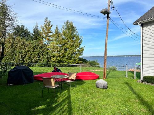 Geneva House | Cottage at Cast Away Kayaks Fire Pit & Game Room