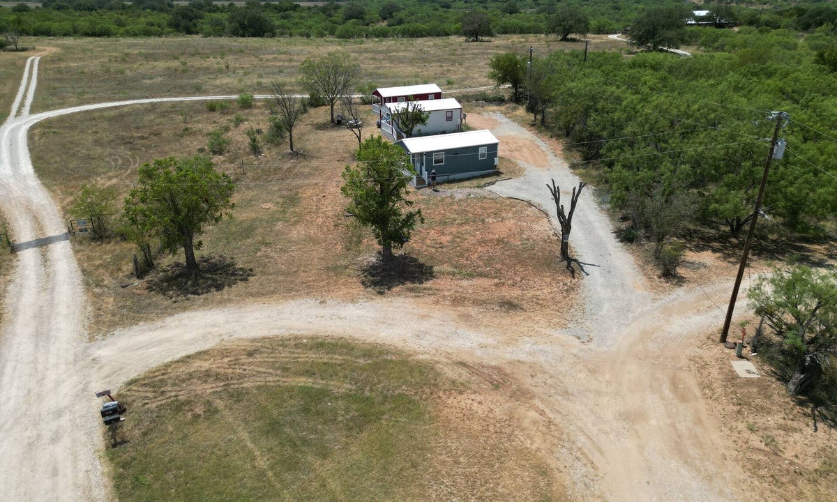 Richland Springs Cabin | Coyote Country White Cabin 1BR/1BA on a tall hill